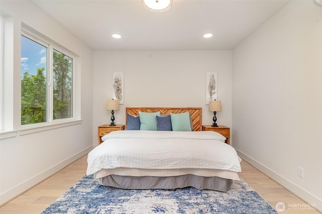 4019B 4th Ave NE, Seattle, WA 98105 - bedroom featuring baseboards, recessed lighting, and light wood-style flooring
