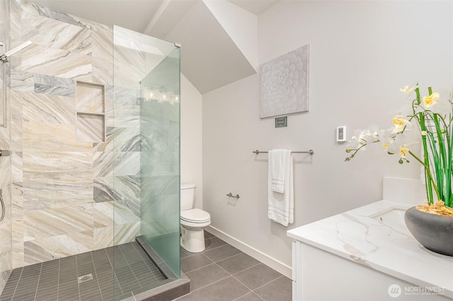 4019B 4th Ave NE, Seattle, WA 98105 - bathroom with baseboards, tile patterned floors, a tile shower, and toilet