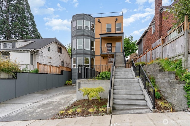 4019B 4th Ave NE, Seattle, WA 98105 - view of front of property featuring stairway and fence
