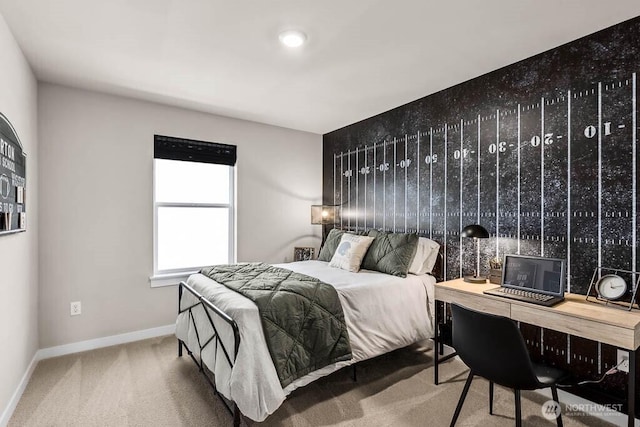 bedroom with baseboards and carpet floors