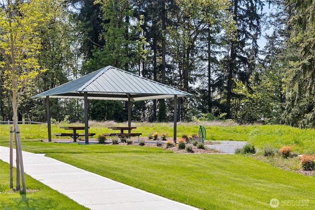 view of home's community with a yard and a gazebo