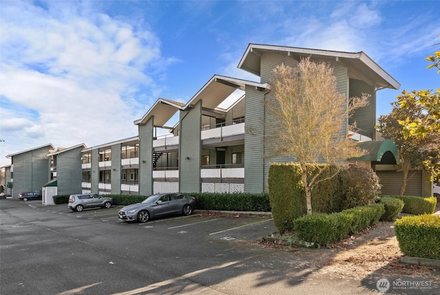 7924 212th St SW Unit 202, Edmonds, WA 98026 - view of property with uncovered parking
