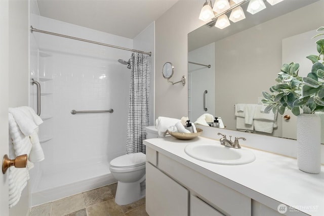 7924 212th St SW Unit 202, Edmonds, WA 98026 - bathroom with toilet, stone finish floor, curtained shower, and vanity