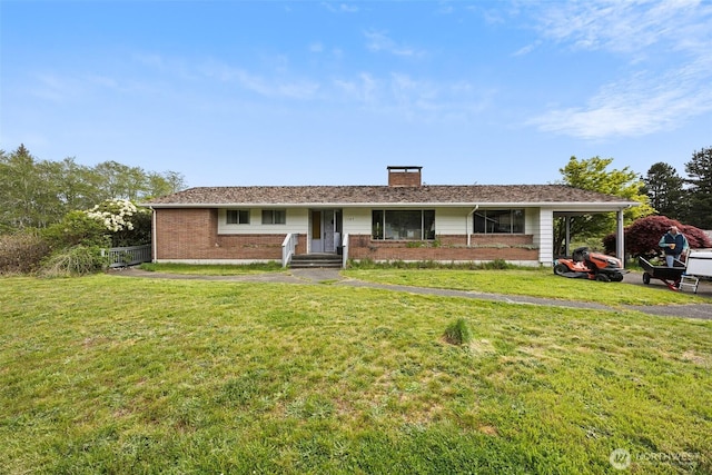 ranch-style house with brick siding, fence, a chimney, and a front lawn