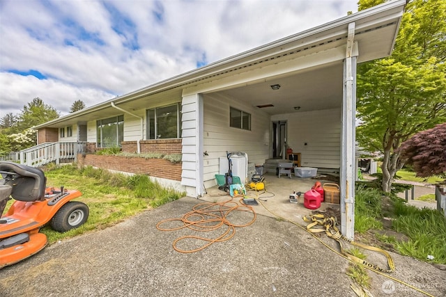 exterior space with brick siding