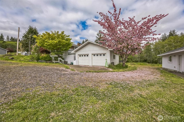 garage with driveway
