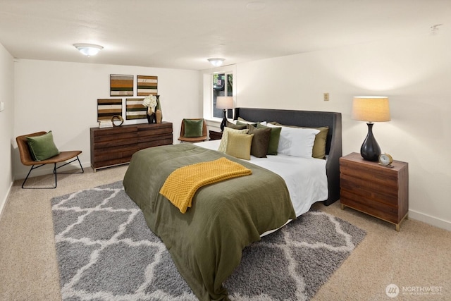 bedroom featuring carpet flooring and baseboards