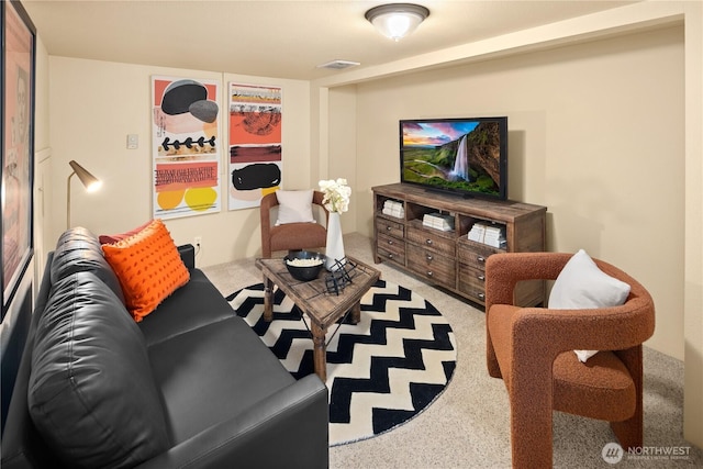 carpeted living room featuring visible vents