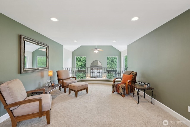 living area featuring baseboards, recessed lighting, carpet, and vaulted ceiling
