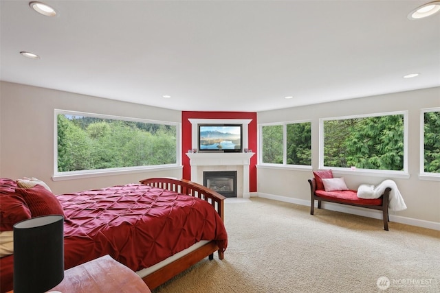 carpeted bedroom with baseboards and recessed lighting