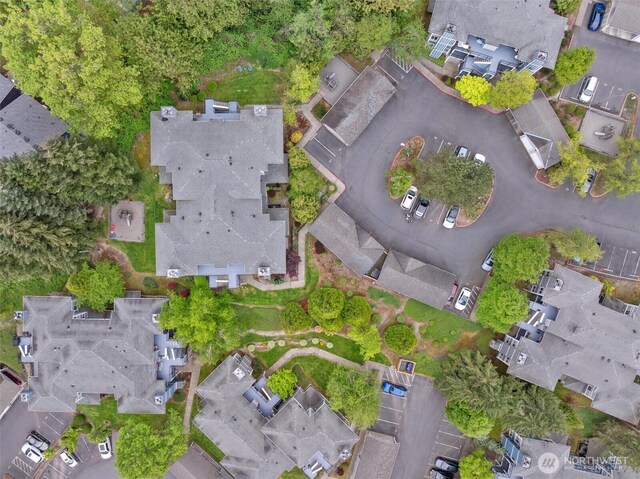 birds eye view of property with a residential view