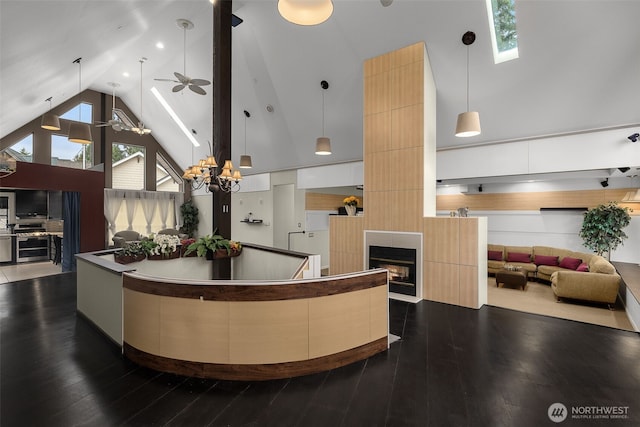 reception featuring a ceiling fan and a fireplace