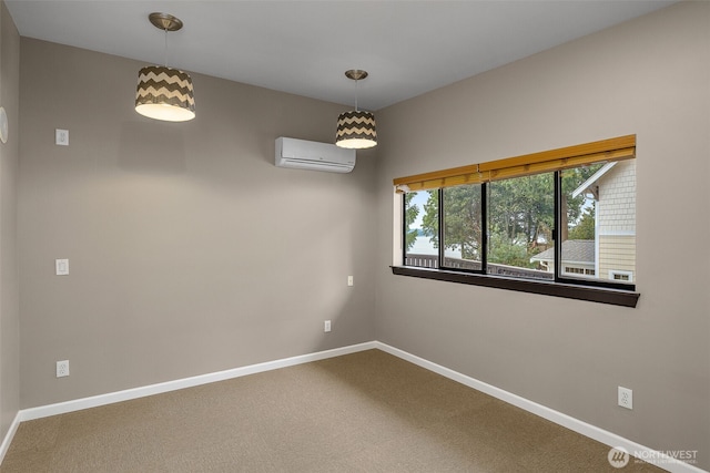 carpeted spare room with baseboards and a wall unit AC