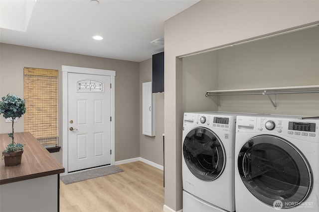 laundry room featuring independent washer and dryer, laundry area, light wood-style flooring, recessed lighting, and baseboards