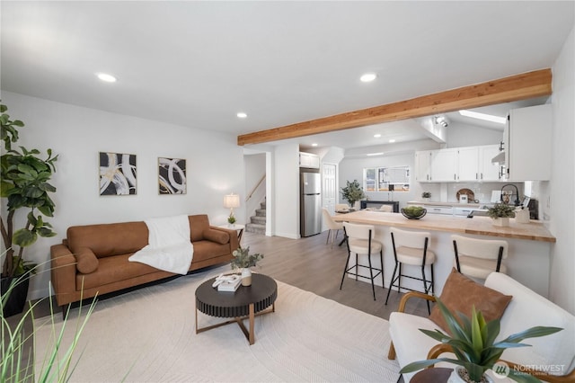 916 S Sheridan Ave, Tacoma, WA 98405 - living room with recessed lighting, stairway, beamed ceiling, and light wood finished floors