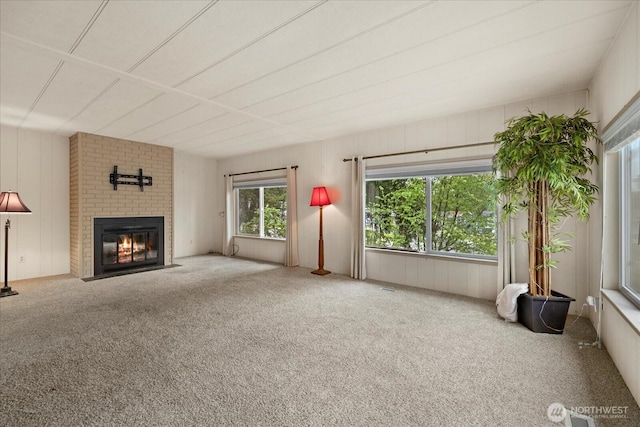 19003 129th Ave NE, Bothell, WA 98011 - unfurnished living room featuring carpet floors and a fireplace