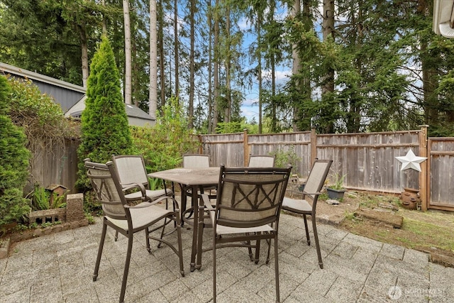 19003 129th Ave NE, Bothell, WA 98011 - view of patio / terrace featuring outdoor dining space and a fenced backyard