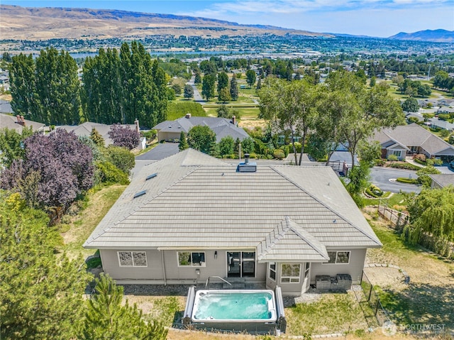 drone / aerial view featuring a mountain view