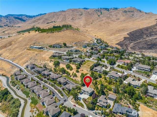 bird's eye view featuring a residential view and a mountain view