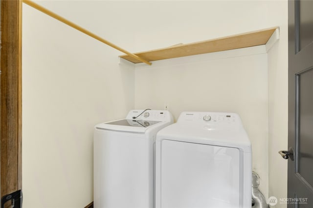 laundry area with independent washer and dryer and laundry area