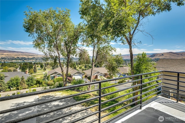 balcony featuring a residential view