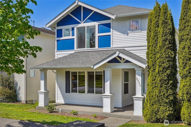 3234 Hoffman Hill Blvd, Dupont, WA 98327 - view of front facade featuring roof with shingles and covered porch