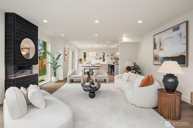 3968 162nd Pl SE, Bellevue, WA 98006 - living area featuring wood finished floors, recessed lighting, and baseboards