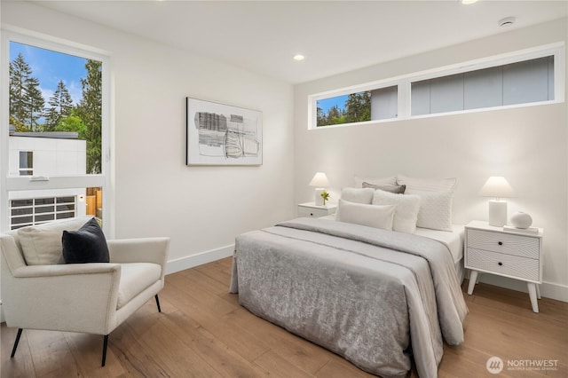 3968 162nd Pl SE, Bellevue, WA 98006 - bedroom featuring wood finished floors, recessed lighting, and baseboards