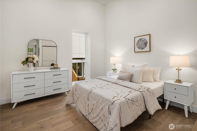 3968 162nd Pl SE, Bellevue, WA 98006 - bedroom featuring wood finished floors and a high ceiling