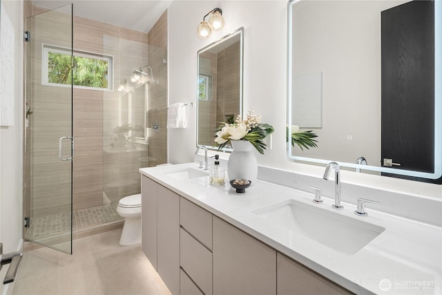 3968 162nd Pl SE, Bellevue, WA 98006 - bathroom with tile patterned floors, a shower stall, toilet, and double vanity
