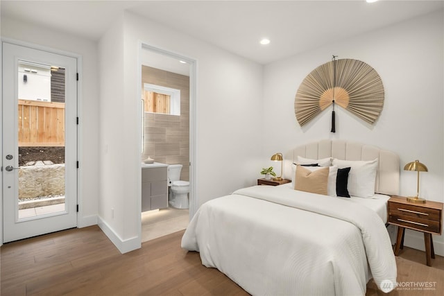 3968 162nd Pl SE, Bellevue, WA 98006 - bedroom featuring access to exterior, recessed lighting, ensuite bathroom, wood finished floors, and baseboards