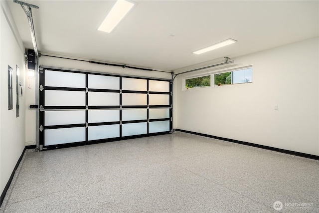 3968 162nd Pl SE, Bellevue, WA 98006 - garage featuring baseboards and electric panel