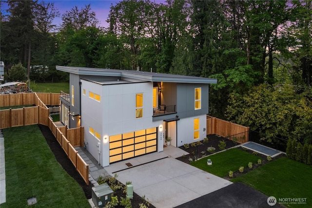 3968 162nd Pl SE, Bellevue, WA 98006 - modern home with a balcony, concrete driveway, and a garage