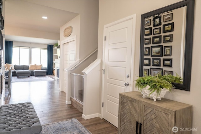 entryway with recessed lighting, baseboards, and wood finished floors