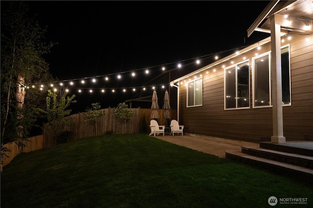 yard at twilight with fence