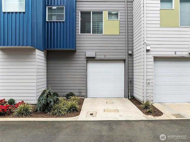 exterior space featuring a garage