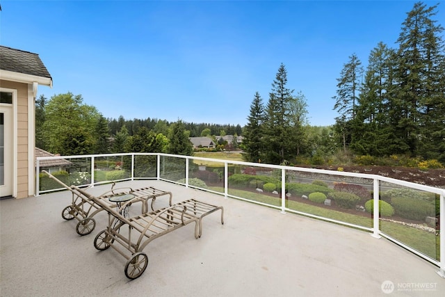 view of patio / terrace with a balcony
