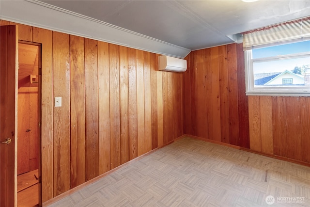 additional living space featuring a wall mounted AC and wood walls