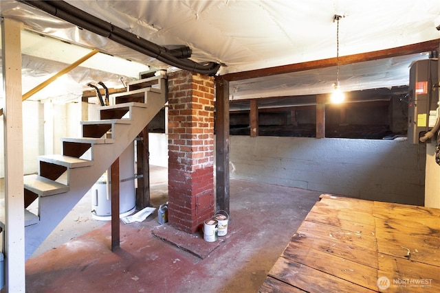 unfinished basement featuring stairway