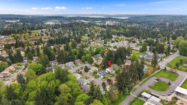 birds eye view of property with a residential view