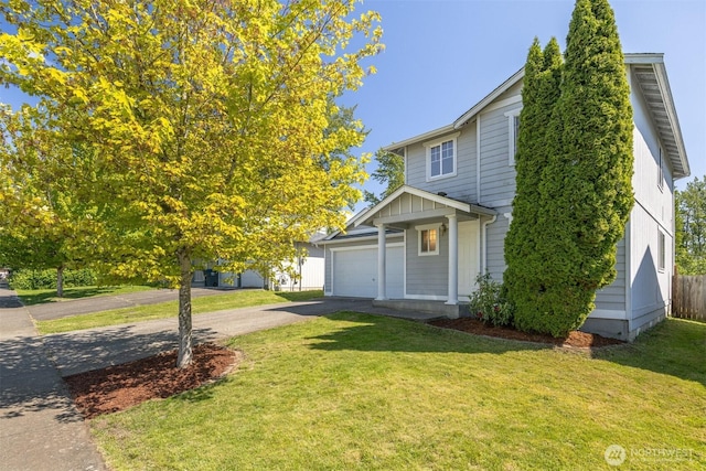 1507 Fruitland Dr, Bellingham, WA 98226 - view of front of property featuring driveway, a front lawn, and an attached garage