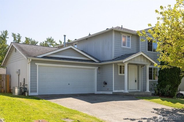 1507 Fruitland Dr, Bellingham, WA 98226 - traditional home with concrete driveway, an attached garage, and a shingled roof