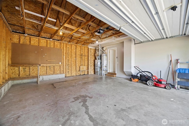 1507 Fruitland Dr, Bellingham, WA 98226 - garage featuring a garage door opener and secured water heater