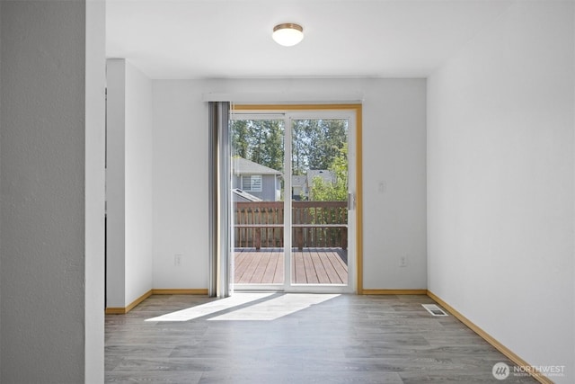 1507 Fruitland Dr, Bellingham, WA 98226 - spare room featuring wood finished floors and baseboards