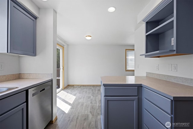 1507 Fruitland Dr, Bellingham, WA 98226 - kitchen featuring stainless steel dishwasher, open shelves, plenty of natural light, and light wood-type flooring
