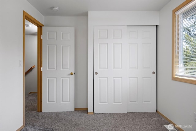 1507 Fruitland Dr, Bellingham, WA 98226 - unfurnished bedroom featuring carpet flooring, a closet, and baseboards