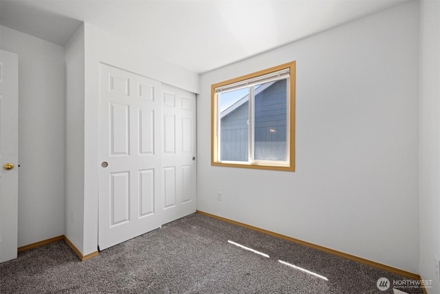 1507 Fruitland Dr, Bellingham, WA 98226 - unfurnished bedroom featuring carpet flooring, baseboards, and a closet