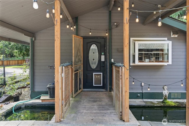 property entrance featuring fence