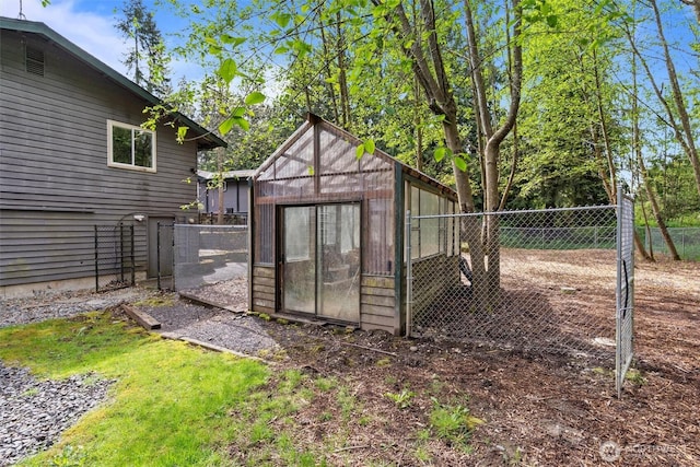 view of outbuilding with an outbuilding and fence private yard
