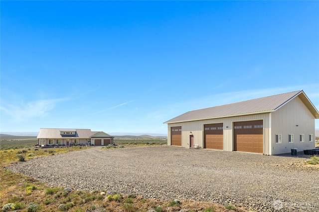 detached garage with a mountain view